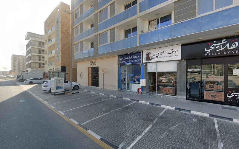 Raehat Alzohor Laundry in Muwaileh Commercial